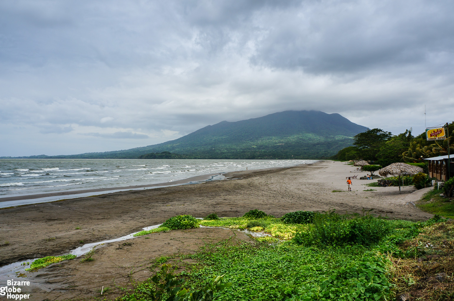 Imposing volcanos against black sand beaches in Ometepe Island, Nicaragua