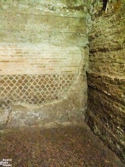 Ancient Roman tile floor in the Basilica San Clemente, Rome, Italy