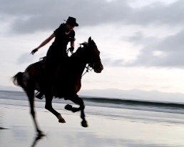 Piritta riding at the beach at Rancho Chilamate, Nicaragua