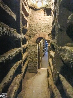 Many small loculis in the Catacomb of Priscilla, Rome, italy