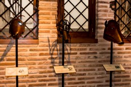 Masks of shame for the gossiping people in the torture equipment exhibition in Toledo, Spain