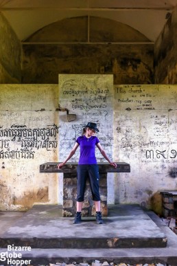 Me at the altar in the old church in Bokor Hill Station, Cambodia