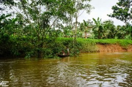 Rama children in traditional canoe, Indio Maíz, NIcaragua