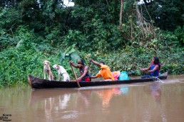 Rama traveling with a traditional canoe in Reserva Biológica Indio Maíz, Nicaragua