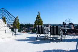 The upper suite of Hotel Lord Byron has a huge terrace with views over Borghese gardens