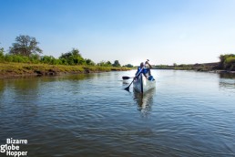 Canoeing through shallow channel on the Zambezi