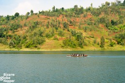 Locals travelinf through Lake Kivu with a small passenger boat