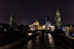 Charles Bridge at night in Prague, Czech Republic.