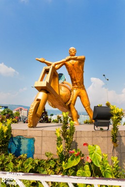 A communist-styled statue stands in a roundabout in the middle of the center of Goma, Democratic Republic of the Congo.