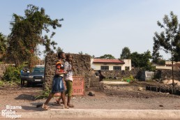 Two girls walking in the street in Goma, Democratic Republic of the Congo.