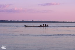 Take a sunset tour in the Colombian Amazonas to meet local families and fishermen